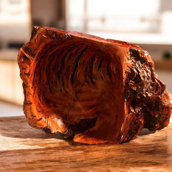 hand-carved burl wood likely from redwood or amboyna.